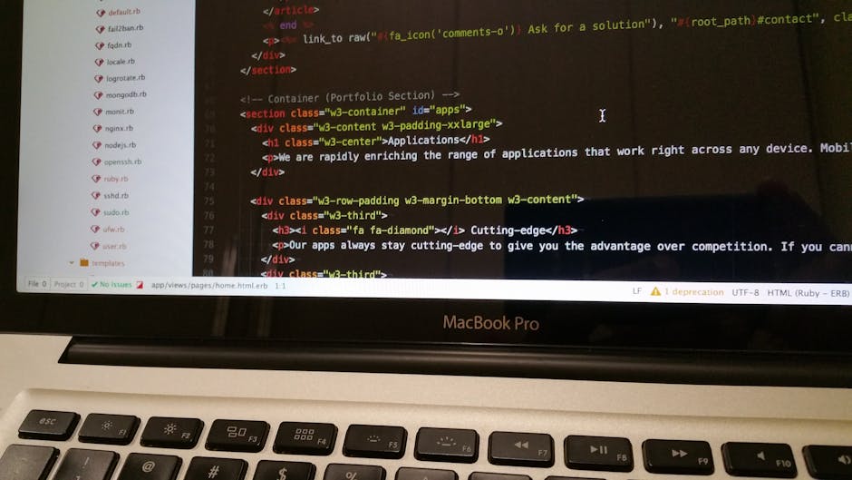 A close-up view of a MacBook Pro displaying a code editor with HTML code on a web page related to gardening, specifically titled 'Blocked access jobs common problems for Teddington gardeners' from the